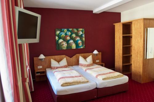Postel nebo postele na pokoji v ubytování Hotel Perler Hof