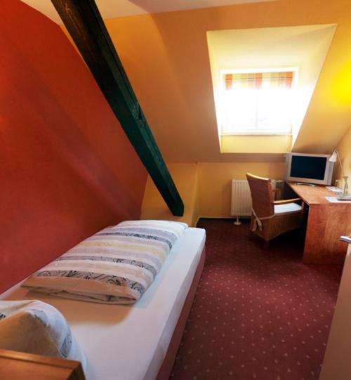 Postel nebo postele na pokoji v ubytování Hotel Perler Hof