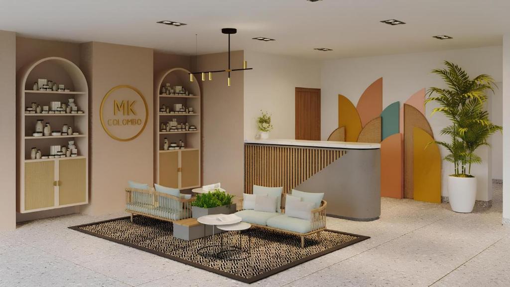 a living room with a couch and a table at MK Colombo in Colombo