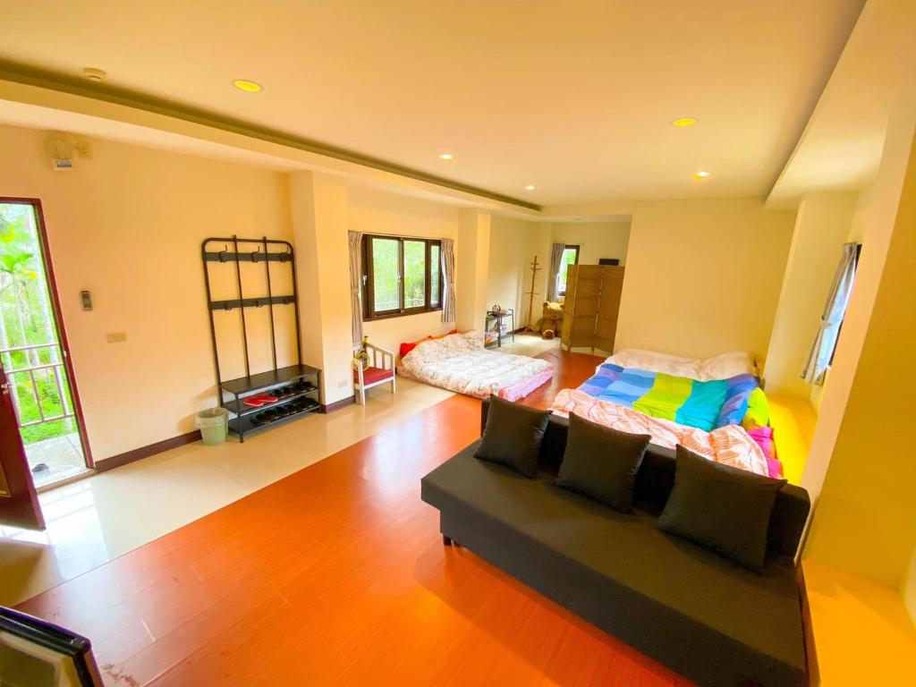 Ένα ή περισσότερα κρεβάτια σε δωμάτιο στο 蔓條絲裡Slow Motion B&B