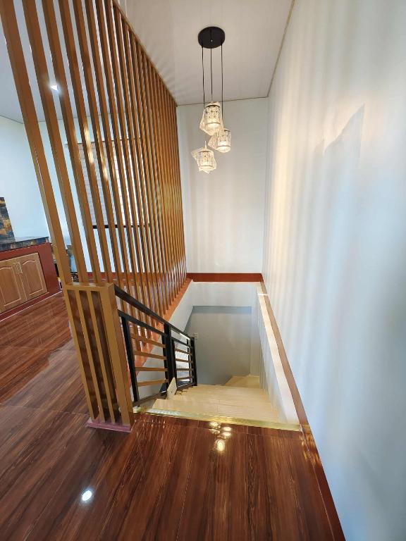 a glass staircase with a glass floor in a room at PA L Residence in Euscara