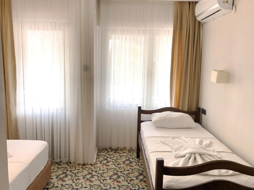 AKSEL BUTİK OTEL - Dreibettzimmer