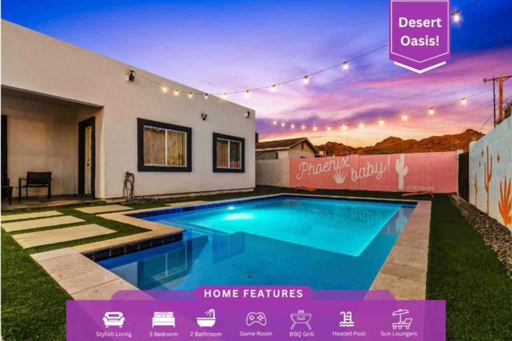 a house with a swimming pool in the yard at Heated Pool Game Room, Mountain Views in Phoenix