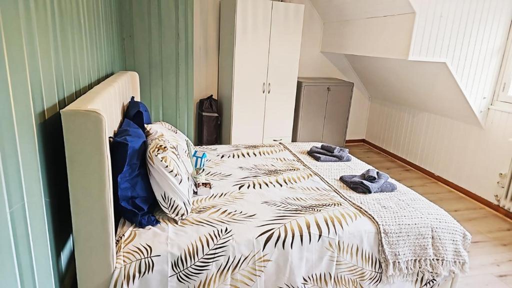 Postel nebo postele na pokoji v ubytování Plein cœur du Portel, Cosy à 5 min à pied de la plage