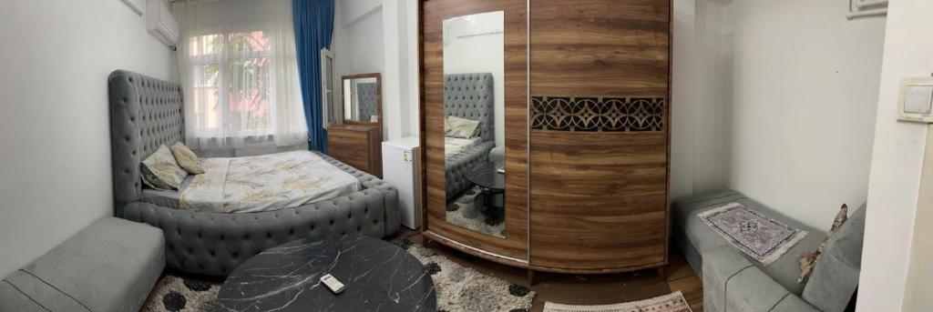 Postel nebo postele na pokoji v ubytování Cozy Room in Heart of Istanbul