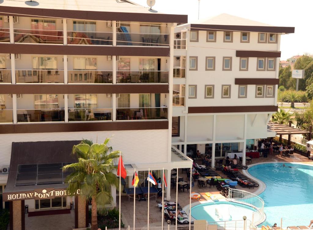 an aerial view of a hotel with a swimming pool at Holiday City Hotel-All Inclusive in Side