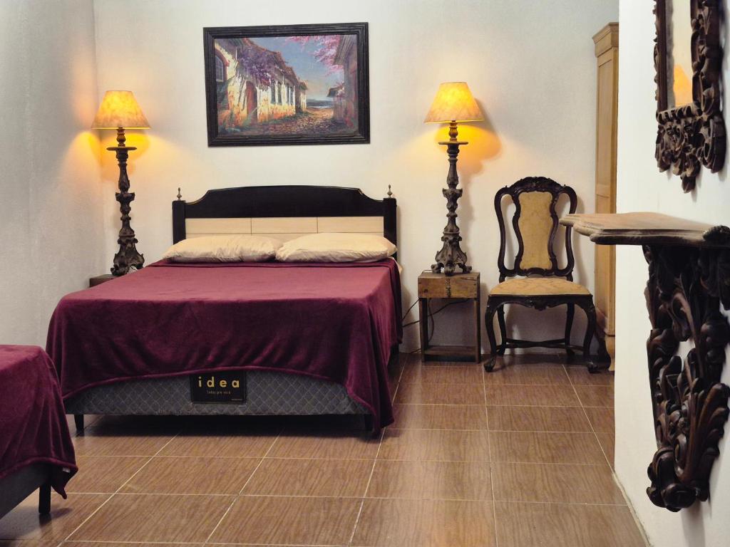 Postel nebo postele na pokoji v ubytování Rancho Sertanejo