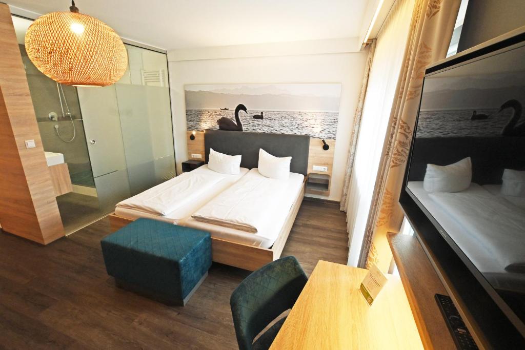 Ein Bett oder Betten in einem Zimmer der Unterkunft Hotel Ritter