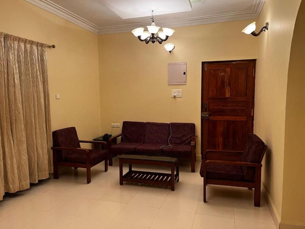 Coin salon dans l'établissement Tha Villa Calangute