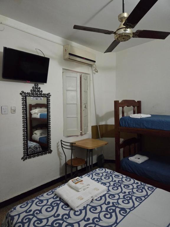 Postel nebo postele na pokoji v ubytování HOTEL HM