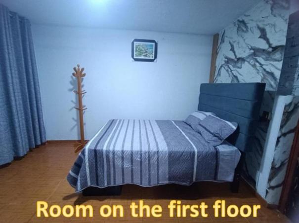 Ένα ή περισσότερα κρεβάτια σε δωμάτιο στο Hospedaje - A y C Taxi- Airport - Accommodation - ROOM ON THE 1ST FLOOR