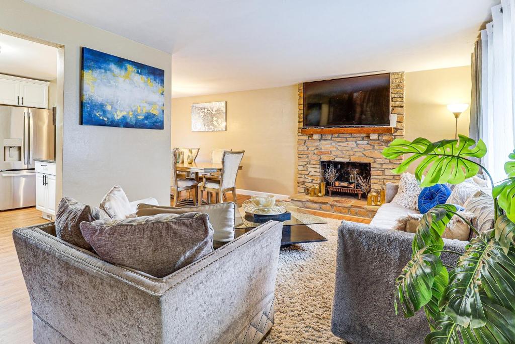 a living room with two couches and a fireplace at 3 Mi to South Park Quiet Pittsburgh Area Getaway in Option