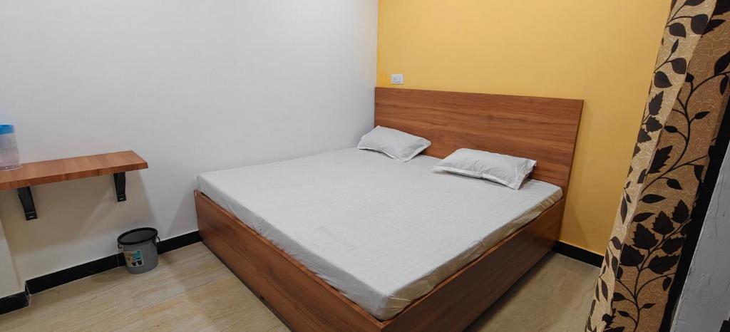 Ένα ή περισσότερα κρεβάτια σε δωμάτιο στο Hotel Mashaal