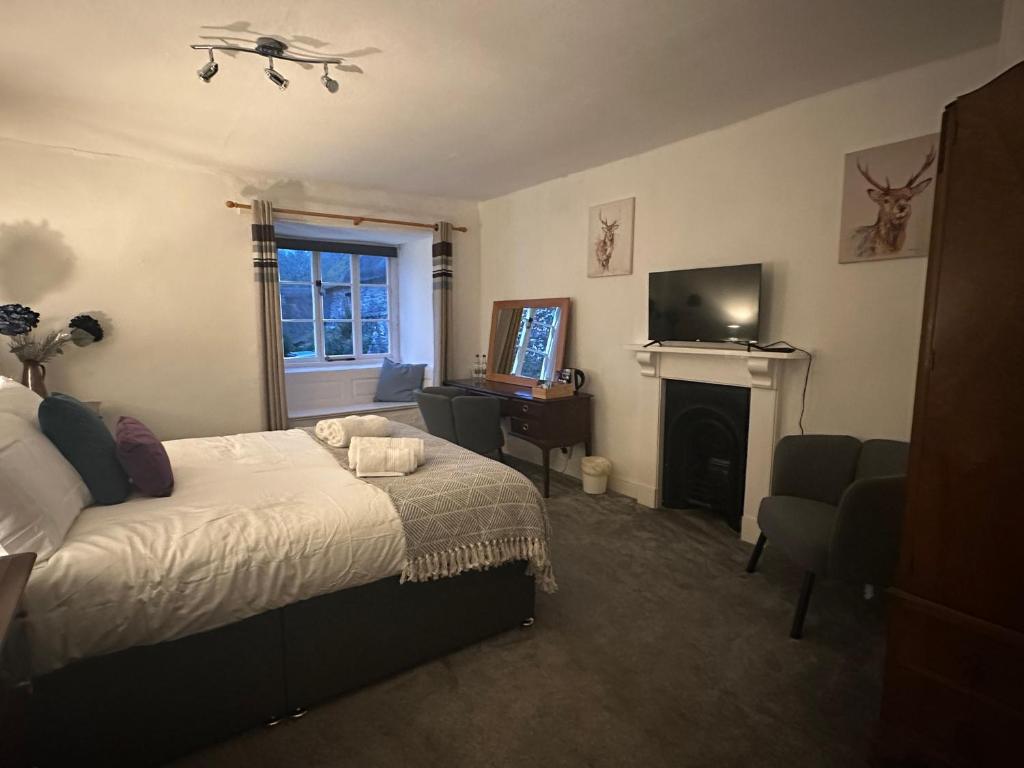 TV a/nebo společenská místnost v ubytování The Cleave Inn