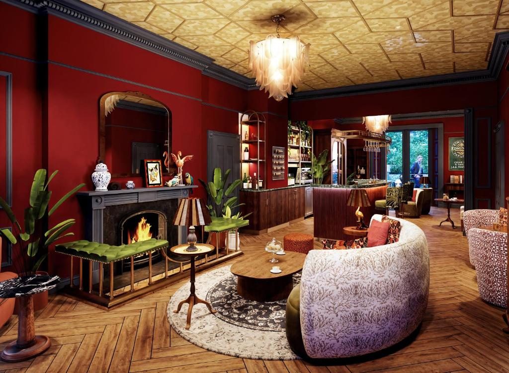 a living room with red walls and a fireplace at Bertrand's Townhouse in London