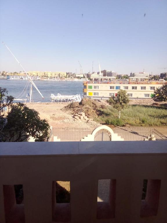 a view of the water from the balcony of a building at The Horizon House in Luxor