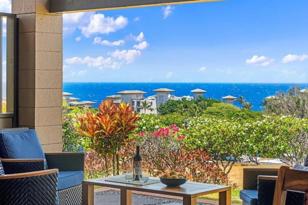a patio with a table and a view of the ocean at Kapalua Ridge Villas 2612 · KRV 2612 Renovated 1BD Ocean Views W in Kahana