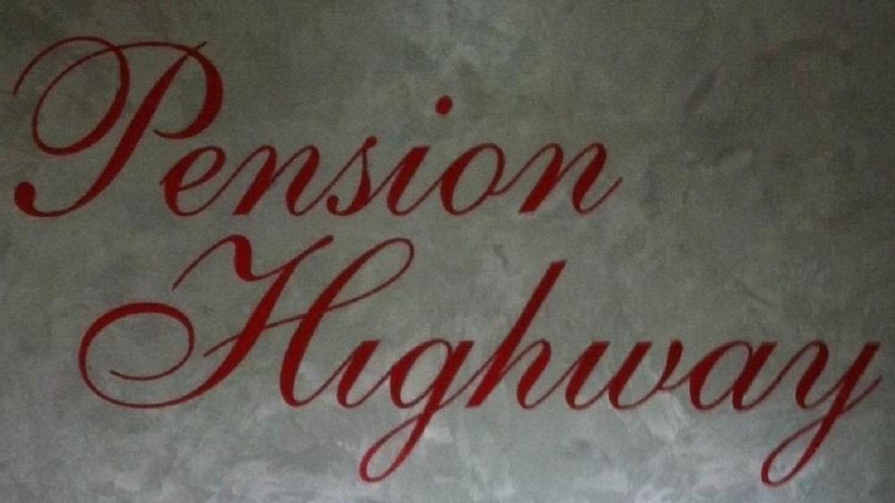 eine rote Schrift auf einem Stück Papier in der Unterkunft Pension Highway in Bünde
