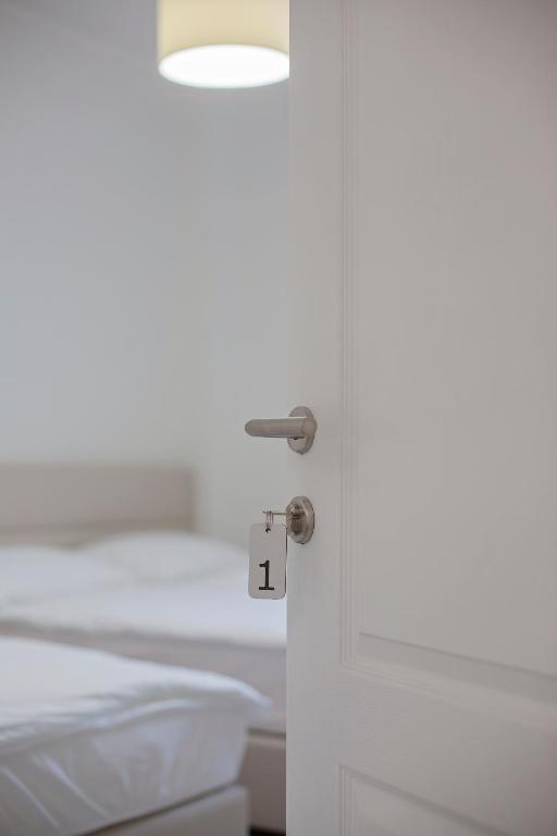 Postel nebo postele na pokoji v ubytování Guest House Vanja