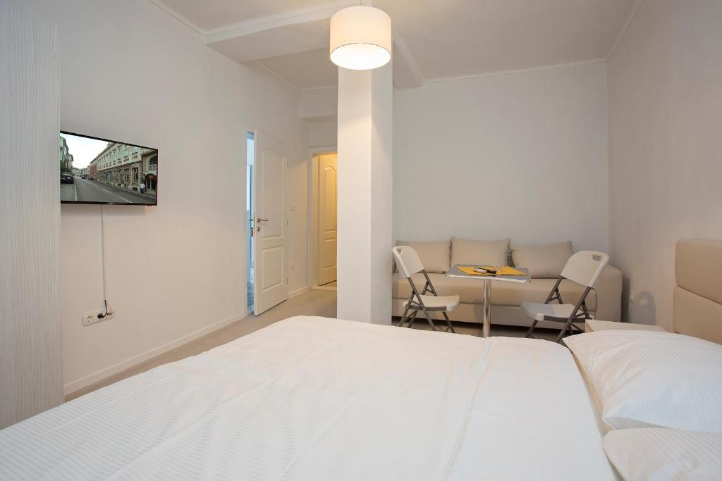 Postel nebo postele na pokoji v ubytování Guest House Vanja