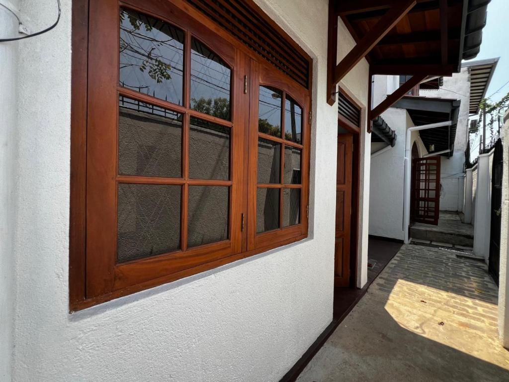 a window on the side of a building at The Shan Guest House in Nugegoda