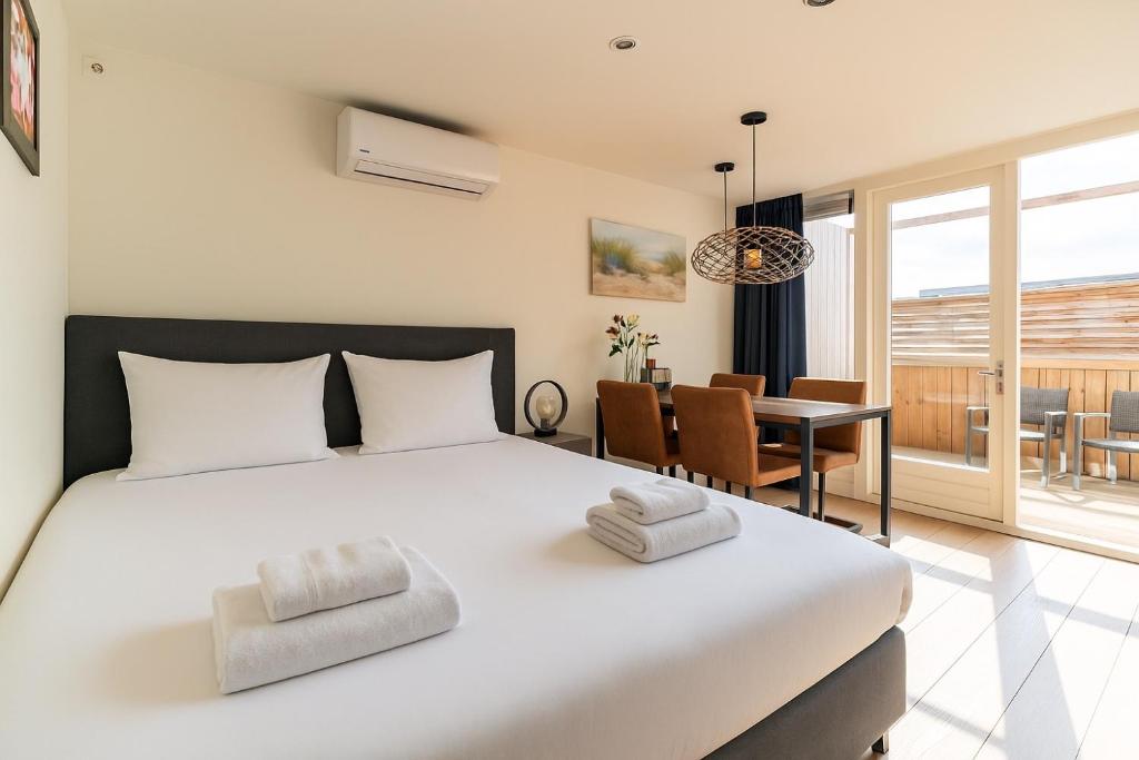 Postel nebo postele na pokoji v ubytování Stylish apartments in the heart of Breda city center