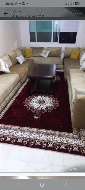 Χώρος καθιστικού στο Appartement ville des roses