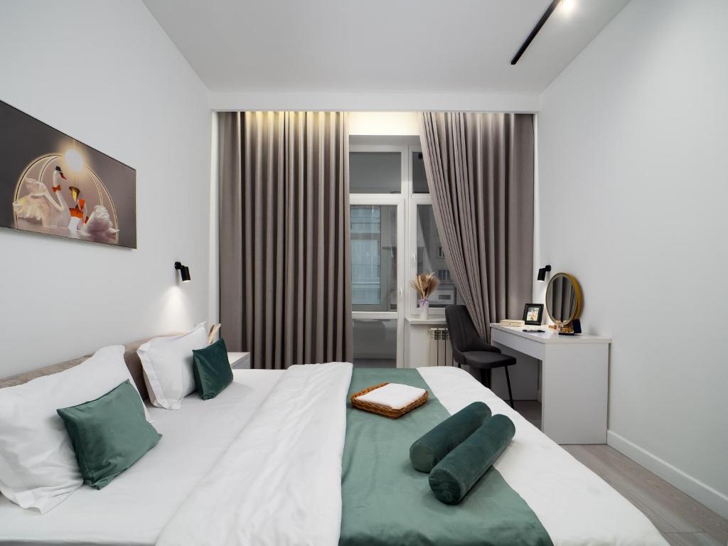 Ένα ή περισσότερα κρεβάτια σε δωμάτιο στο Seven Premium Apartments by Mega Mall