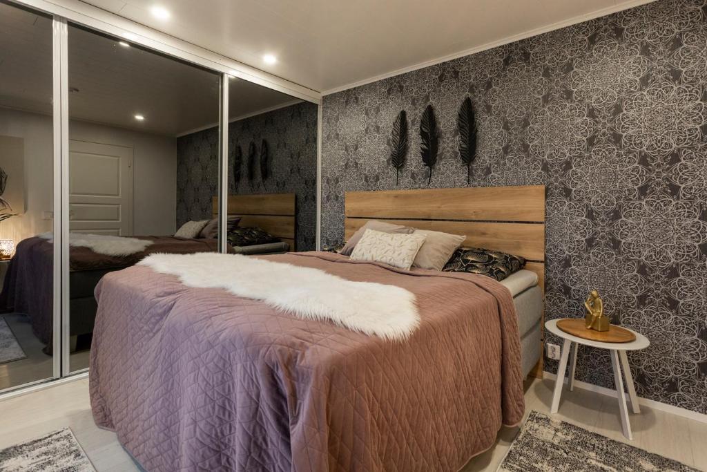 Postel nebo postele na pokoji v ubytování Vasko Luxurious Suites, Firefox