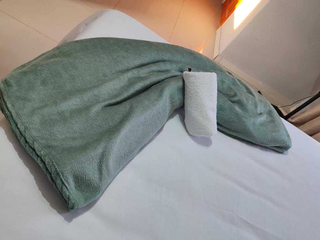 Ένα ή περισσότερα κρεβάτια σε δωμάτιο στο Ekukhanyeni Guest house