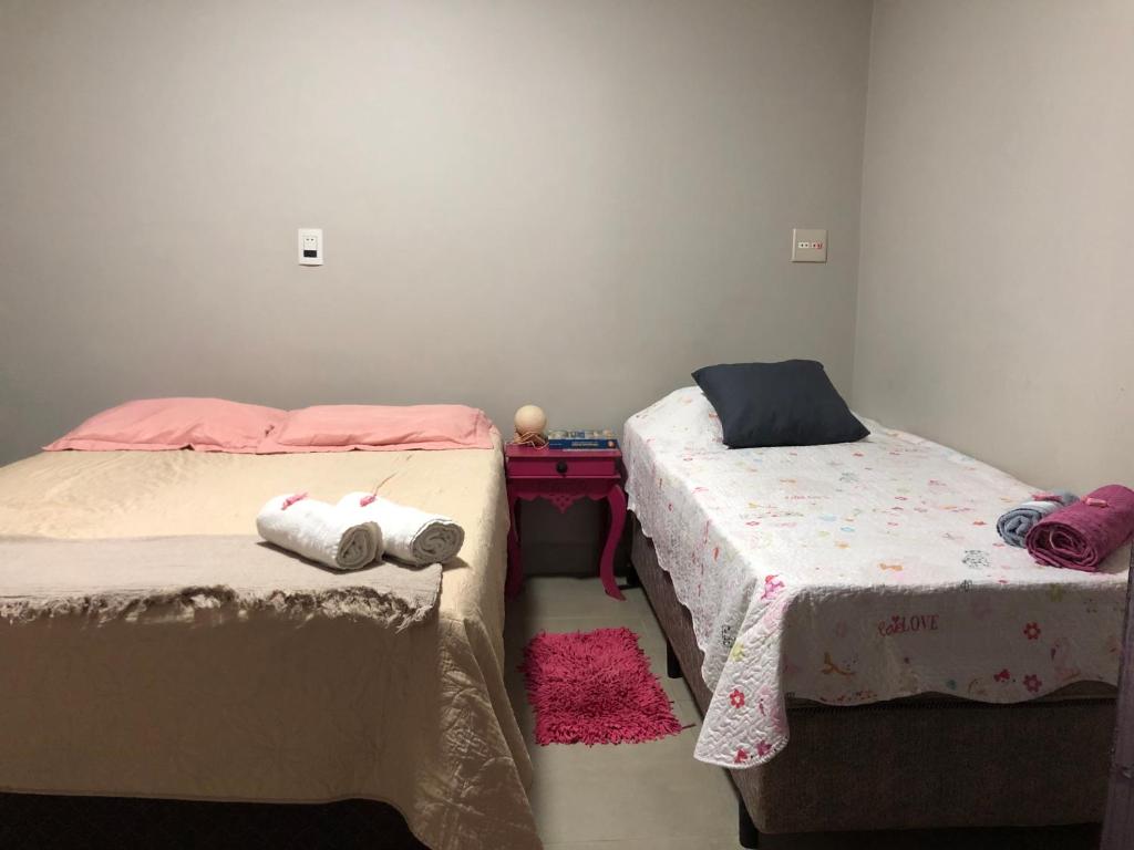 Postel nebo postele na pokoji v ubytování Quarto em Araras