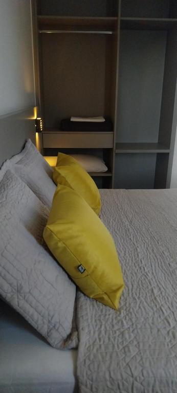 Ένα ή περισσότερα κρεβάτια σε δωμάτιο στο Flat's Da Bia