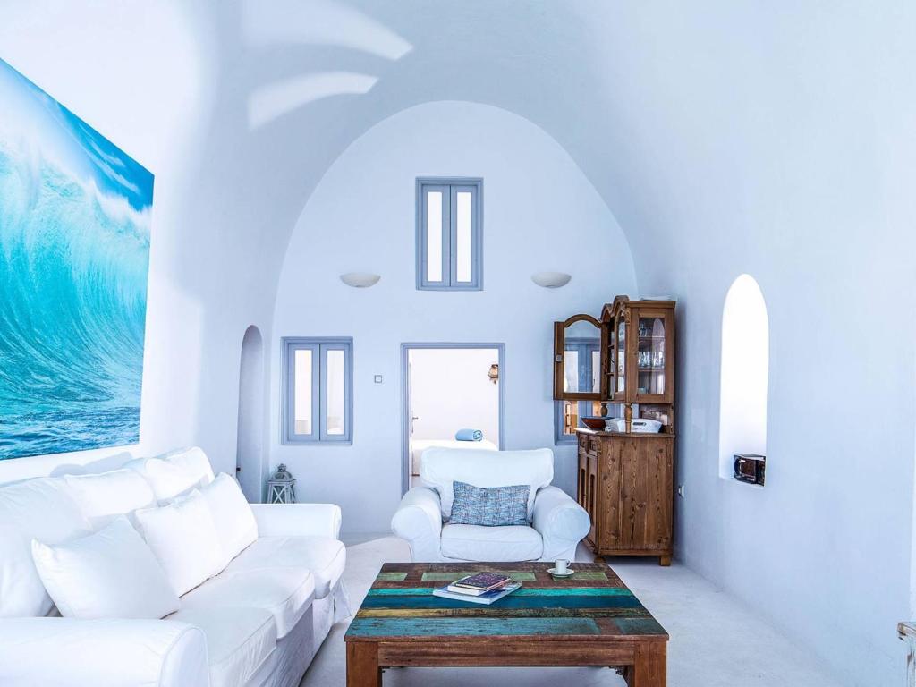 Ένα ή περισσότερα κρεβάτια σε δωμάτιο στο Villa Sunset Cliffside Imerovigli