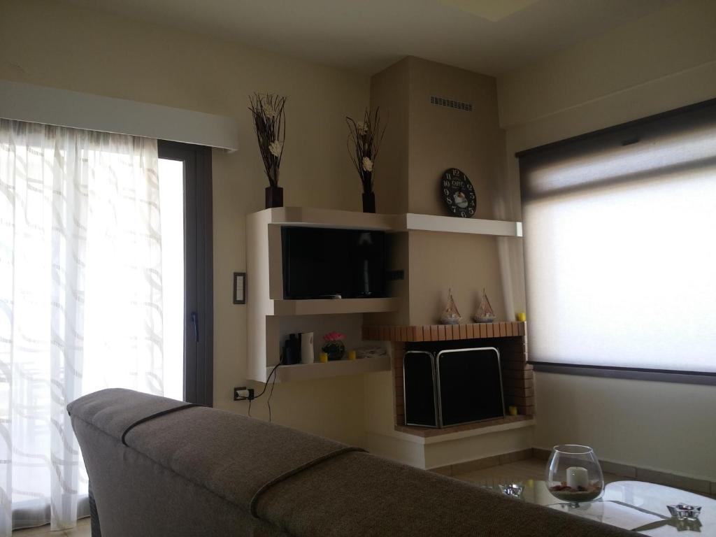 Telewizja i/lub zestaw kina domowego w obiekcie Villa Kefali