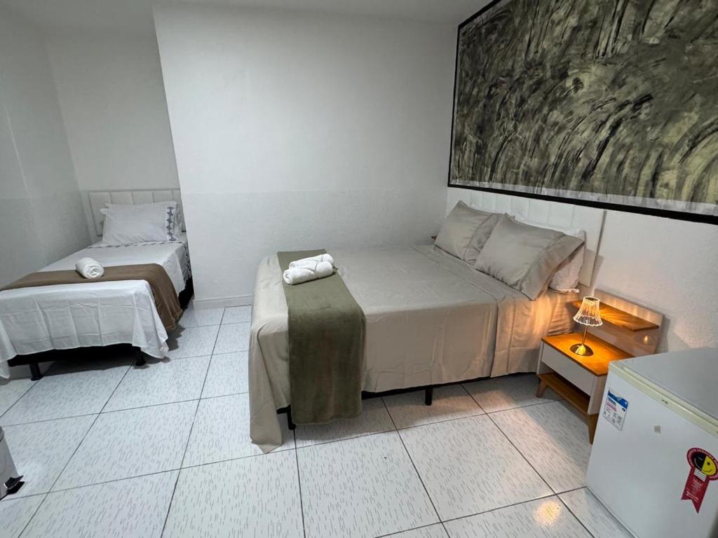 Postel nebo postele na pokoji v ubytování Abaíra Serra Azul Lofts 1