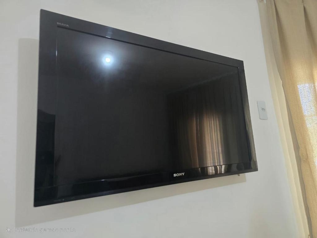 TV a/nebo společenská místnost v ubytování Recanto do Sossego