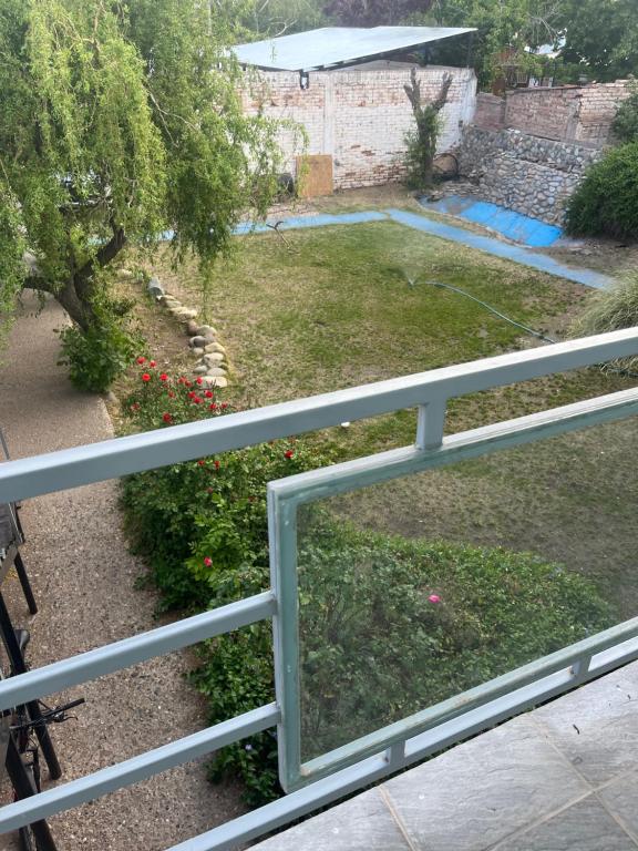 a white fence in front of a yard at Serendipia 2 in Malargüe