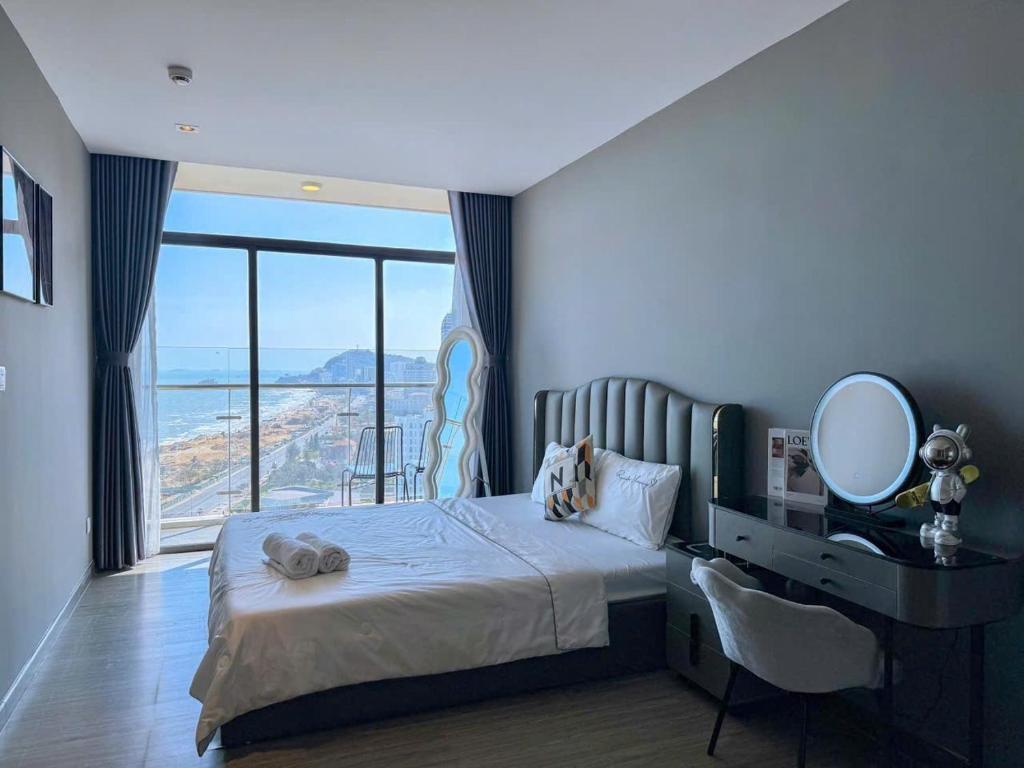 Postel nebo postele na pokoji v ubytování CSJ Tower Vũng Tàu-Seaview & Beachfront Apartment -RUBY HOUSE