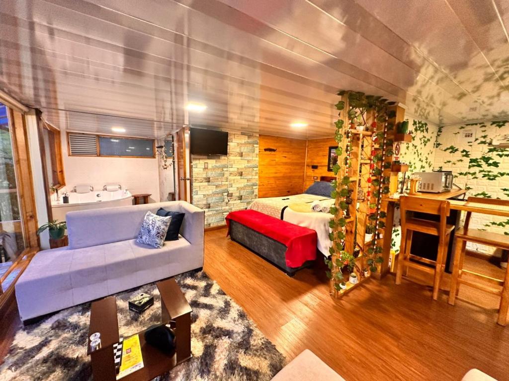 Ένα ή περισσότερα κρεβάτια σε δωμάτιο στο Cabaña arcoiris del lago # 6