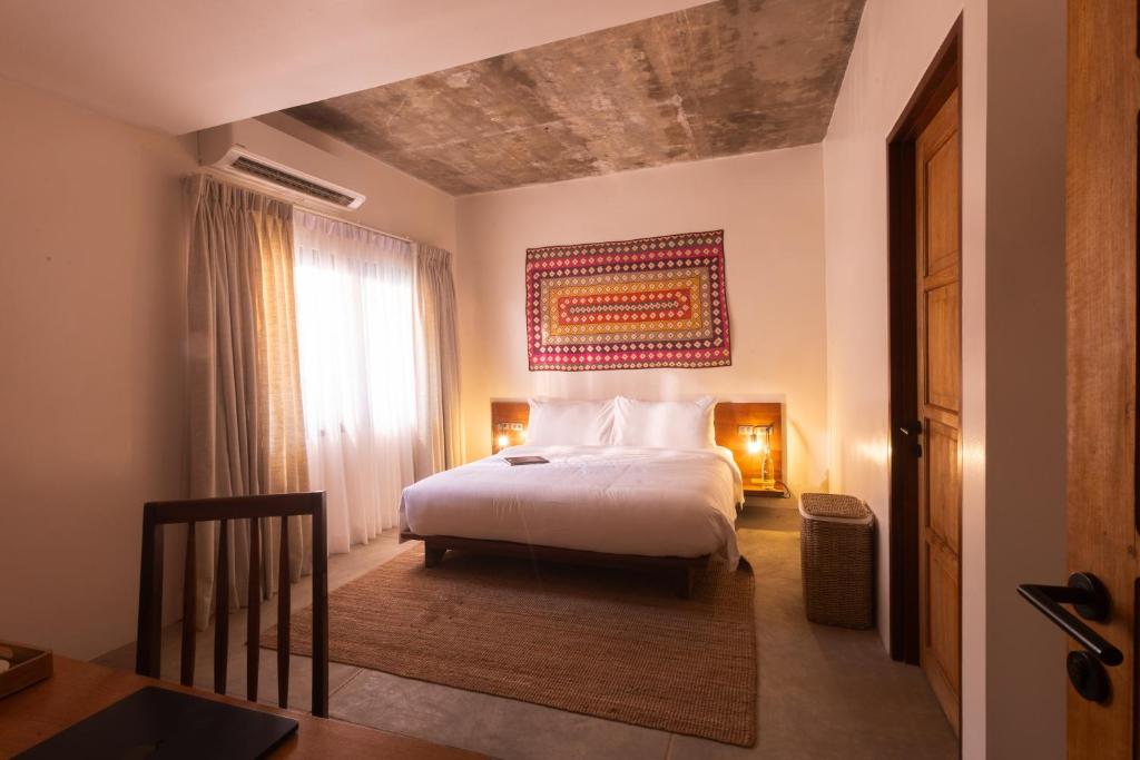 Ένα ή περισσότερα κρεβάτια σε δωμάτιο στο Masa House