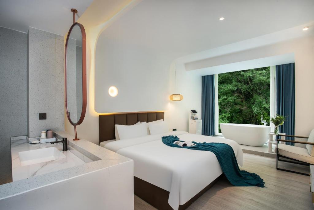 Ένα ή περισσότερα κρεβάτια σε δωμάτιο στο Your Love, My Homestay