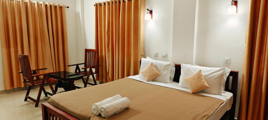 Postel nebo postele na pokoji v ubytování Oxxon Airport Hotel