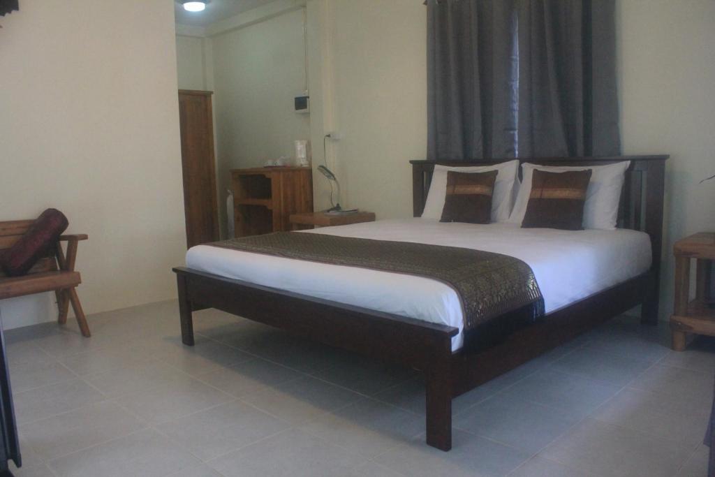 Postel nebo postele na pokoji v ubytování Privacy Resort - Koh Chang