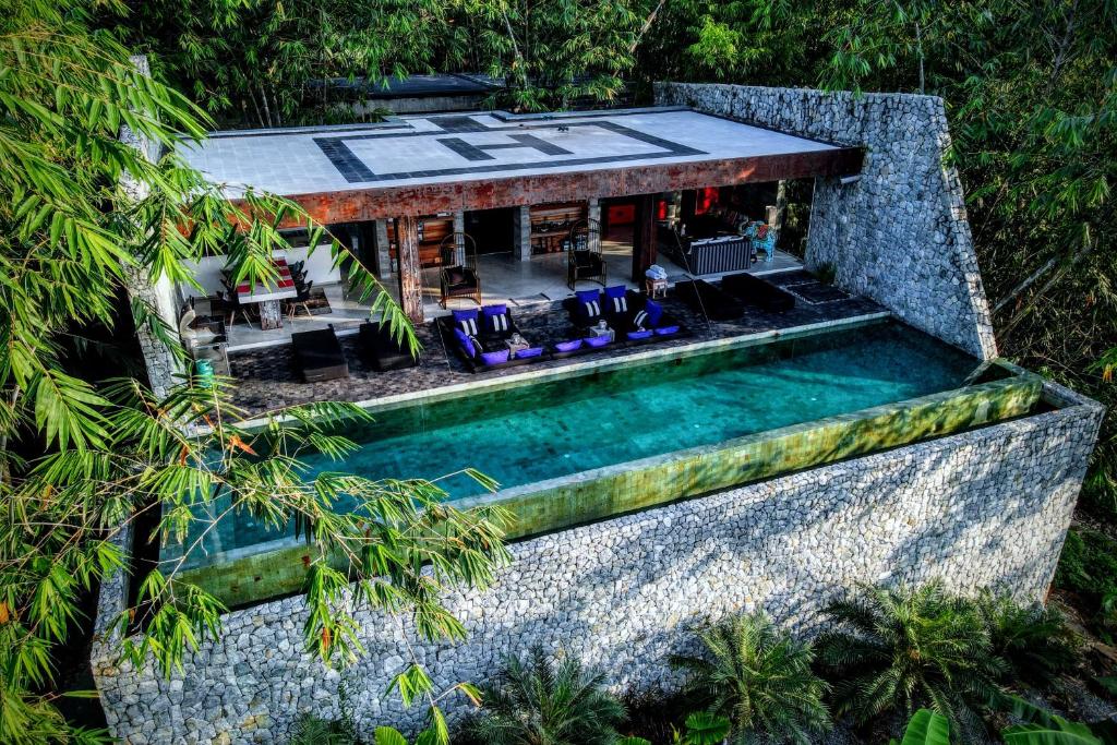 an aerial view of a house with a swimming pool at Z VILLA InstaDream Luxury 180 Sea & Sunset in Ban Taling Ngam