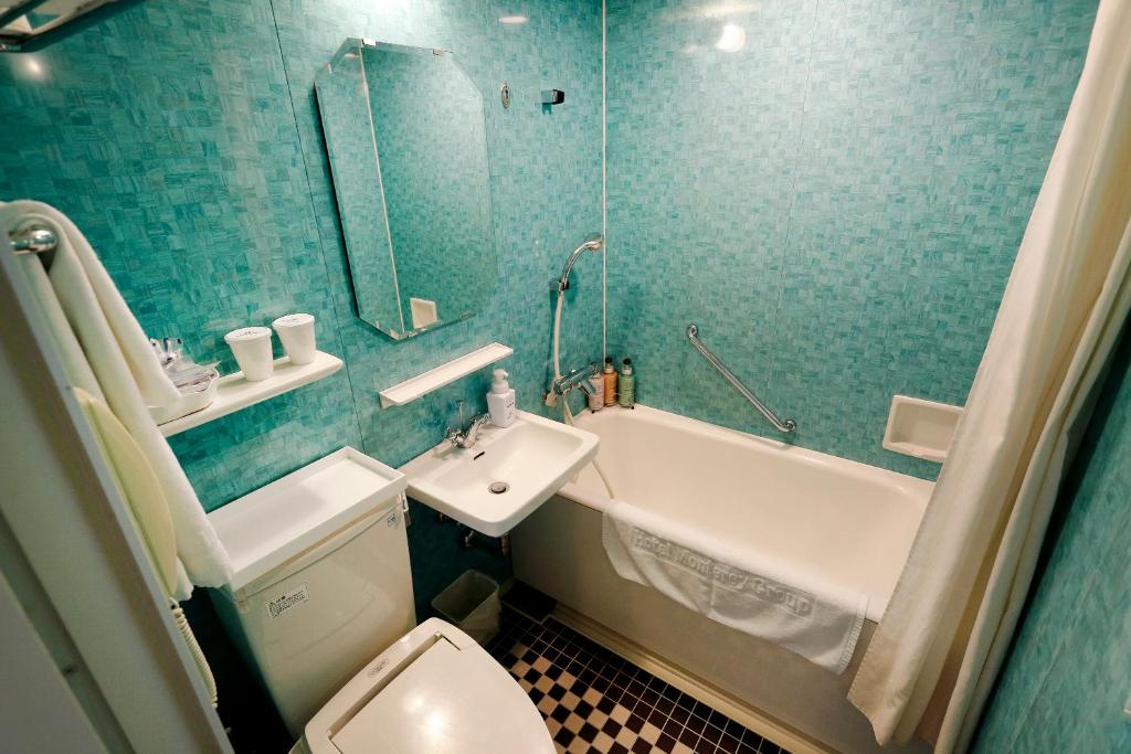 Um banheiro em Hotel Monterey La Soeur Fukuoka