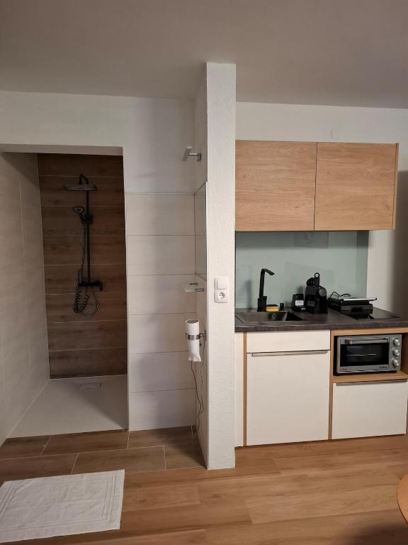 Kuchyň nebo kuchyňský kout v ubytování Kleines Apartment
