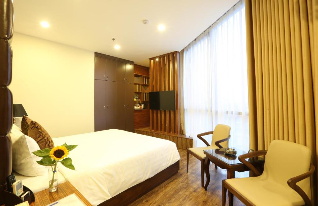 TV a/nebo společenská místnost v ubytování Au Viet Hotel