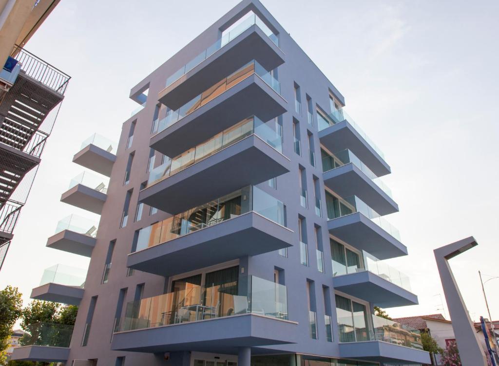 a building with balconies on the side of it at Residence Panama in Lido di Jesolo