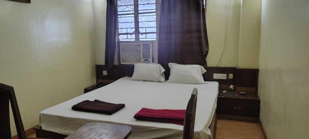 Giường trong phòng chung tại HOTEL O ENERGY SPACE