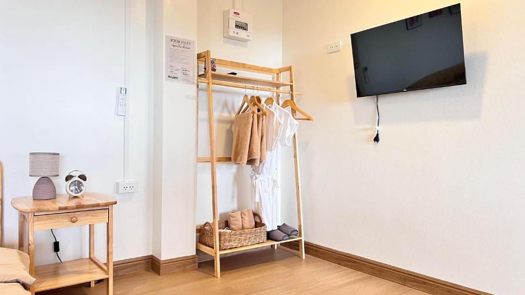 TV a/nebo společenská místnost v ubytování Oxygenphamee